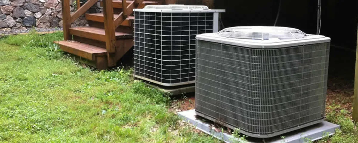 Heat pump installation and service units outside a home in Burlington, MA